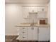 Clean and efficient kitchenette with white cabinets at 1223 E Clearview Dr, Casa Grande, AZ 85122