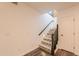 Basement features a staircase with patterned tile and wood railing at 1223 E Clearview Dr, Casa Grande, AZ 85122
