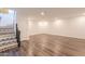 Spacious basement with wood flooring, perfect for recreation at 1223 E Clearview Dr, Casa Grande, AZ 85122