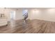 Finished basement with wood floors and an open layout at 1223 E Clearview Dr, Casa Grande, AZ 85122