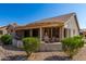 Covered patio with seating area, perfect for outdoor entertaining at 14766 W Piccadilly Rd, Goodyear, AZ 85395