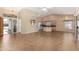 Home entryway with tile flooring and views into the living room and kitchen at 14766 W Piccadilly Rd, Goodyear, AZ 85395
