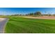 Expansive view of a manicured golf course at 14766 W Piccadilly Rd, Goodyear, AZ 85395