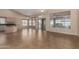 Open floor plan connecting kitchen and living room areas at 14766 W Piccadilly Rd, Goodyear, AZ 85395