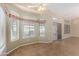 Bright breakfast nook with bay window and tile flooring at 14766 W Piccadilly Rd, Goodyear, AZ 85395