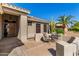 Front porch with seating and desert landscaping at 14766 W Piccadilly Rd, Goodyear, AZ 85395