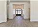 Bright and spacious entryway with a modern light fixture at 2041 N Orchard --, Mesa, AZ 85213