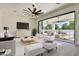 Open living room with sliding doors leading to a patio at 2041 N Orchard --, Mesa, AZ 85213