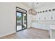 Bright dining area with sliding glass doors to backyard access at 2041 N Orchard --, Mesa, AZ 85213