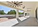 Covered patio with ceiling fans, offering an outdoor living space at 2041 N Orchard --, Mesa, AZ 85213