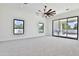 Bright bedroom with sliding glass doors to the backyard at 2041 N Orchard --, Mesa, AZ 85213