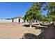 Large backyard with fruit trees and potential for outdoor projects at 2041 N Orchard --, Mesa, AZ 85213