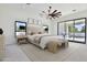 Main bedroom with patio access and lots of natural light at 2041 N Orchard --, Mesa, AZ 85213