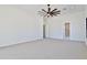 Spacious bedroom with ceiling fan and plush carpeting at 2041 N Orchard --, Mesa, AZ 85213