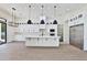 Modern kitchen with white cabinets, island, and stainless steel appliances at 2041 N Orchard --, Mesa, AZ 85213