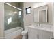 Modern bathroom with a walk-in shower and white vanity at 15424 E Dixileta Dr, Scottsdale, AZ 85262