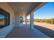 Covered patio with view of desert landscape and partial house view at 15424 E Dixileta Dr, Scottsdale, AZ 85262