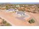 Aerial view of two new homes with desert landscaping at 15424 E Dixileta Dr, Scottsdale, AZ 85262