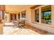Covered patio with seating area and view of the pool at 3105 E Fruitvale Ct, Gilbert, AZ 85297