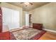 Home office with hardwood floors and double door closet at 3105 E Fruitvale Ct, Gilbert, AZ 85297