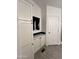 Clean bathroom with white cabinets and a marble countertop at 9302 E Broadway. -- # 147, Mesa, AZ 85208