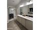 Double vanity bathroom with a walk-in shower at 9302 E Broadway. -- # 147, Mesa, AZ 85208