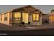 Attractive exterior, charming porch and nicely landscaped at 9302 E Broadway. -- # 147, Mesa, AZ 85208