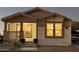 Charming craftsman style exterior, welcoming front porch and well manicured landscaping at 9302 E Broadway. -- # 147, Mesa, AZ 85208