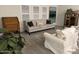 Bright living room with large windows and comfortable seating at 9302 E Broadway. -- # 147, Mesa, AZ 85208