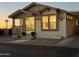 Welcoming exterior with front porch and street view at 9302 E Broadway. -- # 147, Mesa, AZ 85208