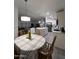 Open concept kitchen with island, dining area, and living room view at 9302 E Broadway. -- # 147, Mesa, AZ 85208