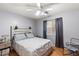 Guest bedroom with a queen-size bed and window at 3813 E Sierrita Rd, San Tan Valley, AZ 85143