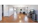 Bright living room with hardwood floors and lots of natural light at 3813 E Sierrita Rd, San Tan Valley, AZ 85143