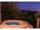 Private hot tub with a picturesque desert night view at 9215 E Red Lawrence Dr, Scottsdale, AZ 85262