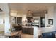 Open kitchen with island, stainless steel appliances, and a breakfast nook at 9215 E Red Lawrence Dr, Scottsdale, AZ 85262