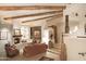 Spacious living room with fireplace and large windows at 9215 E Red Lawrence Dr, Scottsdale, AZ 85262