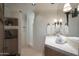 Bathroom with a walk-in shower and double vanity at 9215 E Red Lawrence Dr, Scottsdale, AZ 85262