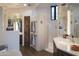Modern bathroom with walk-in shower and double vanity at 9215 E Red Lawrence Dr, Scottsdale, AZ 85262