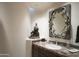 Elegant bathroom with unique mirror and tile at 9215 E Red Lawrence Dr, Scottsdale, AZ 85262