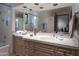 Bathroom with a large mirror and double vanity at 9215 E Red Lawrence Dr, Scottsdale, AZ 85262