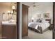 Main bedroom with a king-size bed and ensuite bathroom at 9215 E Red Lawrence Dr, Scottsdale, AZ 85262