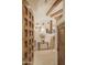 Elegant entryway with wood door and stone floors at 9215 E Red Lawrence Dr, Scottsdale, AZ 85262