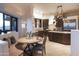 Gourmet kitchen with island, stainless steel appliances, and custom cabinetry at 9215 E Red Lawrence Dr, Scottsdale, AZ 85262