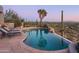 Stunning infinity pool with scenic desert mountain views at 9215 E Red Lawrence Dr, Scottsdale, AZ 85262