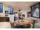 Living area features a fireplace, built-in shelving, and large windows at 9215 E Red Lawrence Dr, Scottsdale, AZ 85262