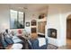 Comfortable living room with fireplace and views at 9215 E Red Lawrence Dr, Scottsdale, AZ 85262