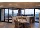 Bright breakfast nook boasts stunning views and a cozy seating area at 9215 E Red Lawrence Dr, Scottsdale, AZ 85262