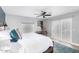 Spacious bedroom with king bed and sliding glass door at 8325 E Crestwood Way, Scottsdale, AZ 85250