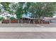 Modern home with a fenced front yard and stone pathway at 8325 E Crestwood Way, Scottsdale, AZ 85250
