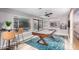 Game room with pool table and access to backyard pool at 8325 E Crestwood Way, Scottsdale, AZ 85250